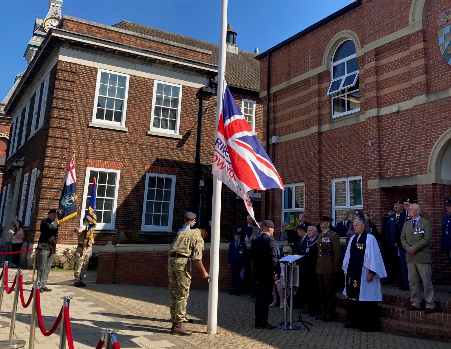Cadet Corporal Arun Ratcliffe raised the Armed Forces flag