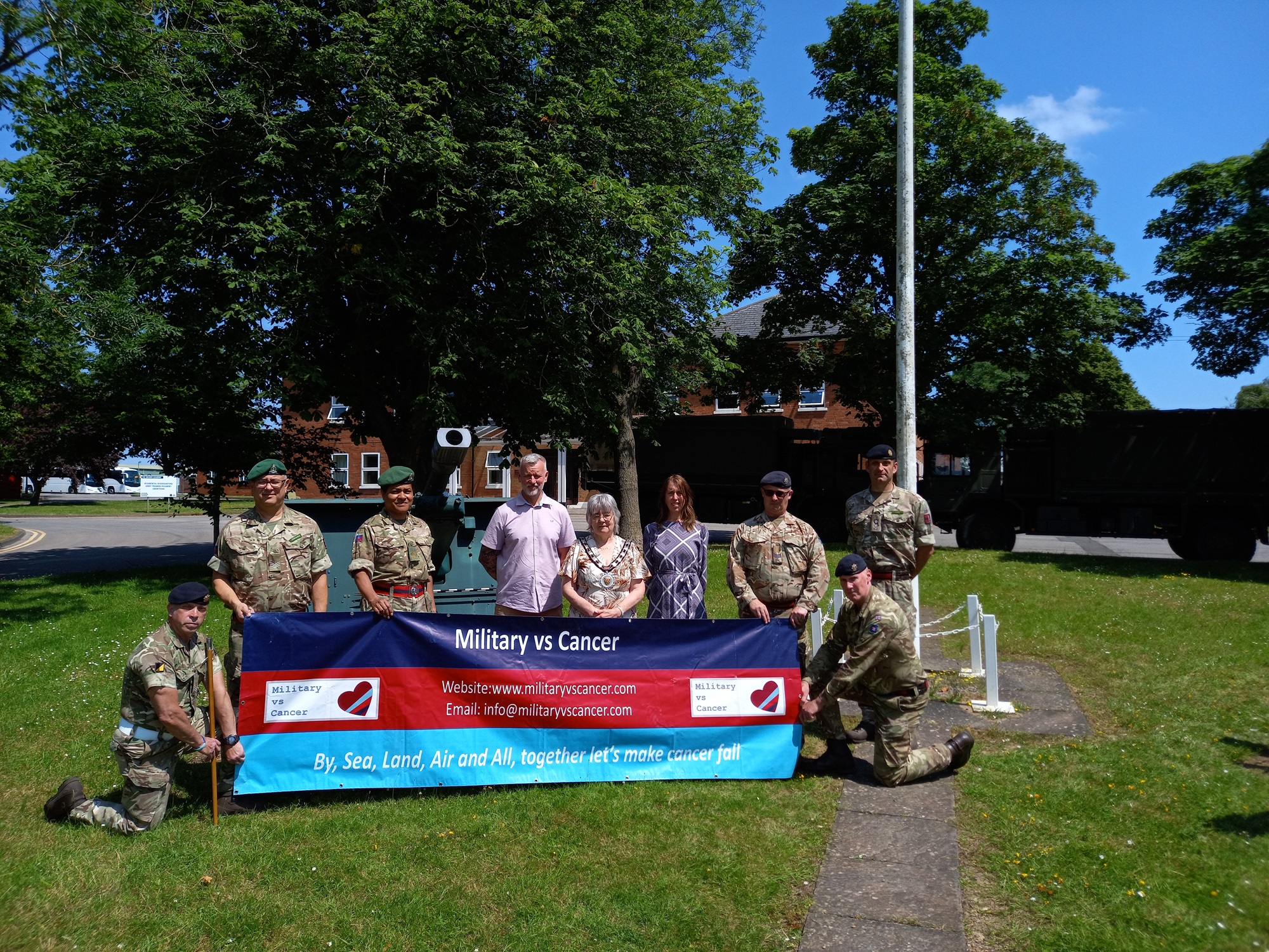 Cllr Johnson (centre) with David and Shelley Bathgate, Lt Col Duncan Lowe (standing right) and Army colleagues