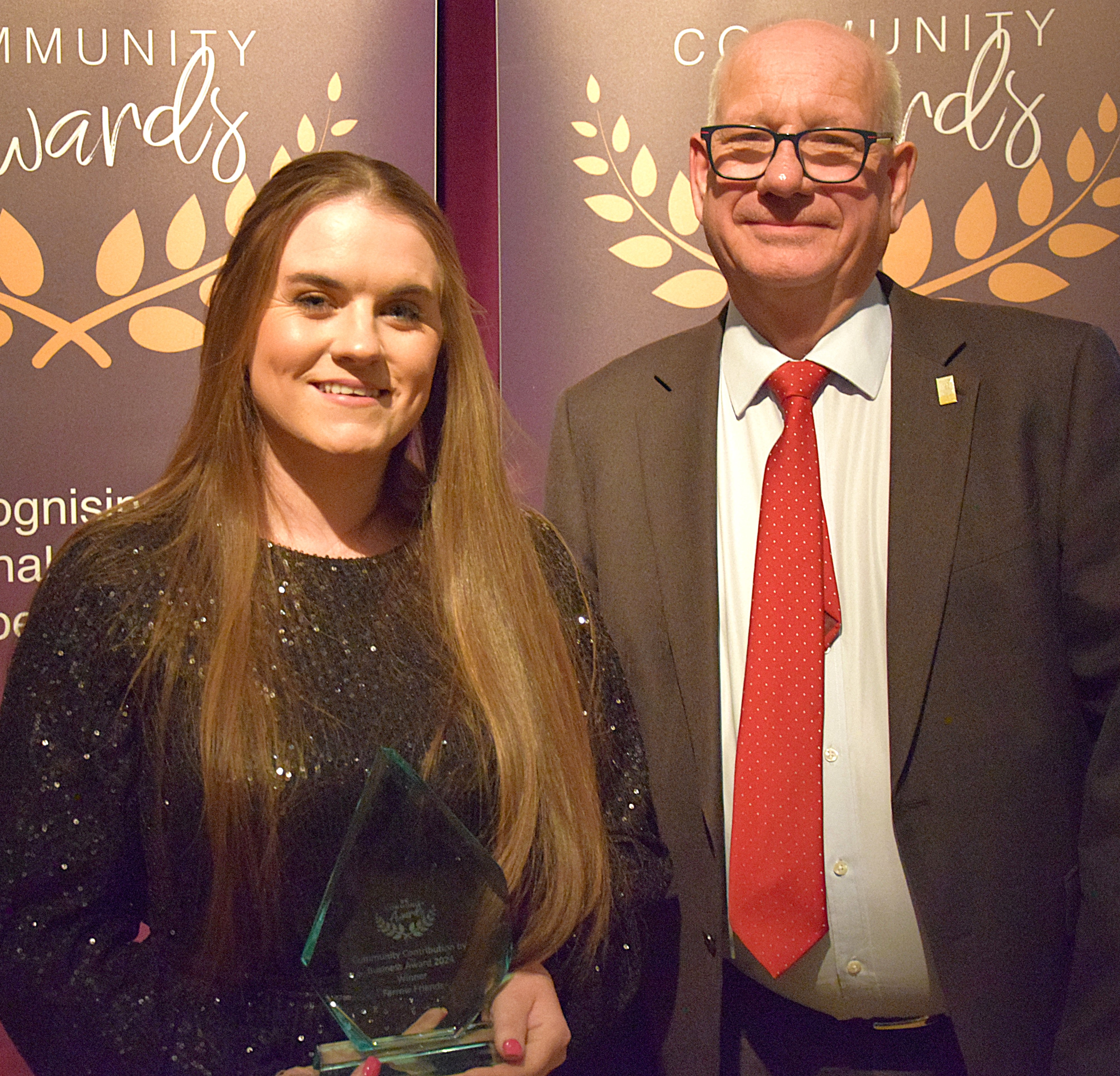 Cllr Richard Cleaver with Lauren Mann of Farrow Friends, winner of the Community Contribution by Business Award