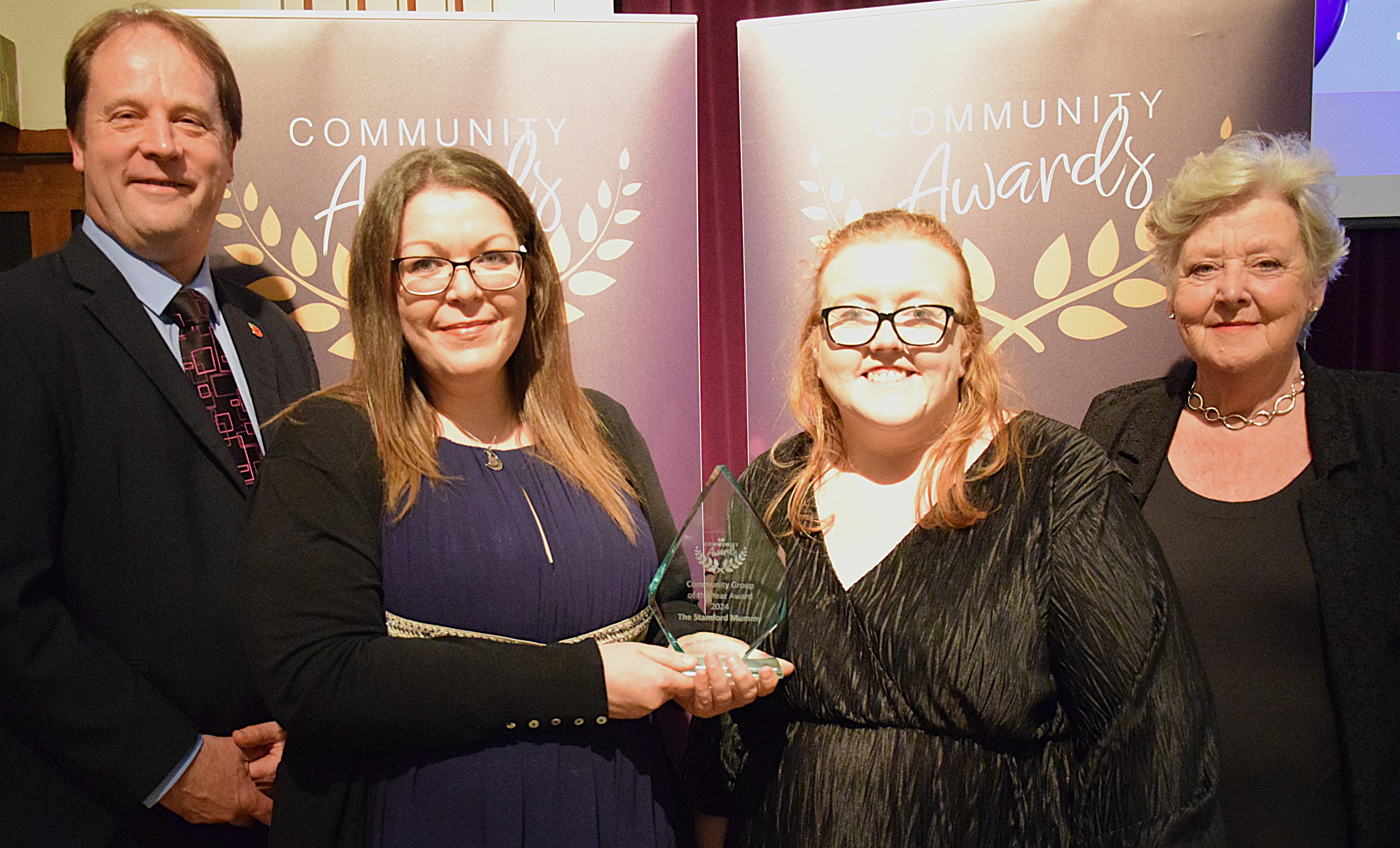 Cllrs Ashley Baxter and Virginia Moran with Nicola Entwistle (left) and Caroline Killington-Parker of The Stamford Mummy who won the Community Group of the Year Award