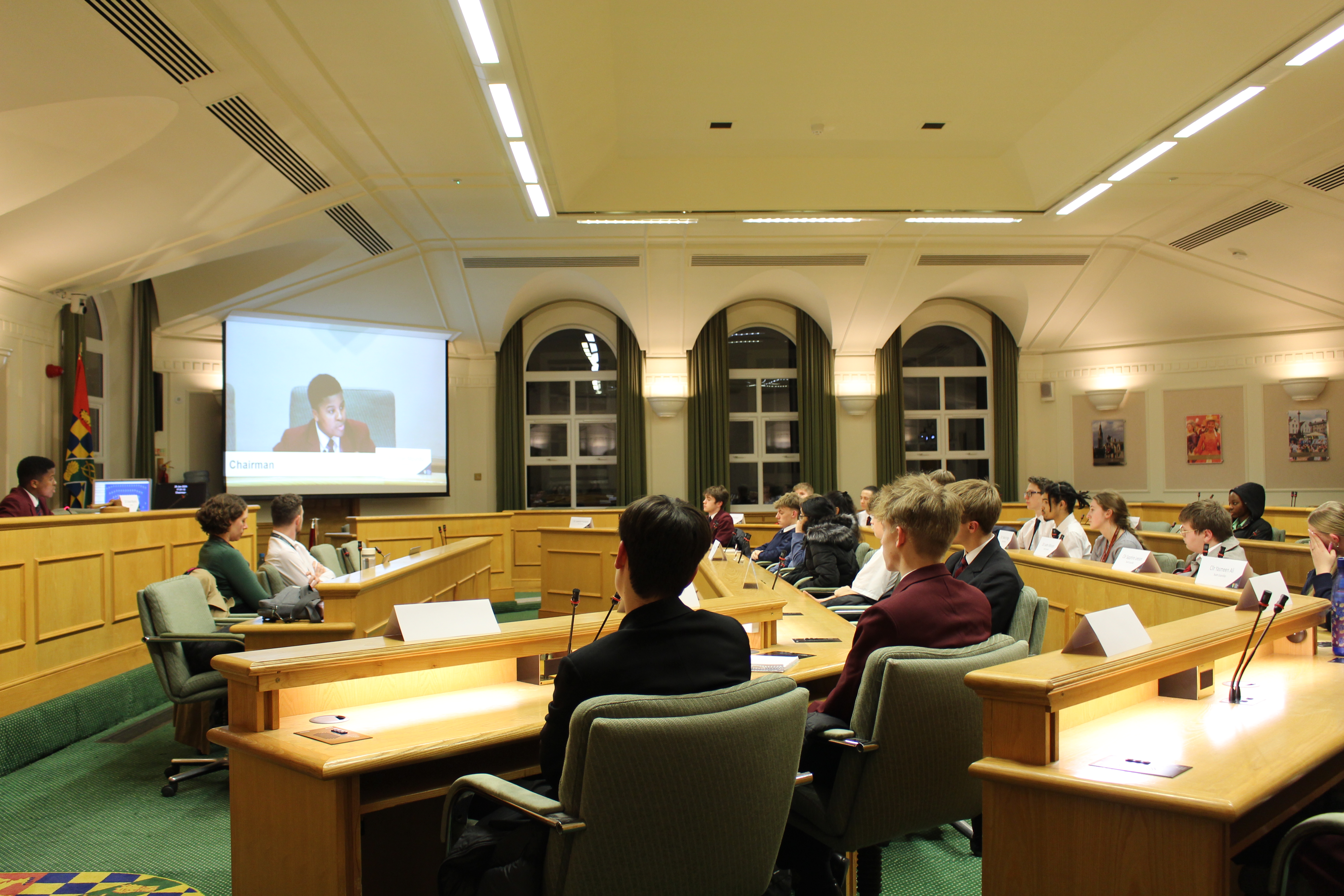 A photo showing a youth council meeting.