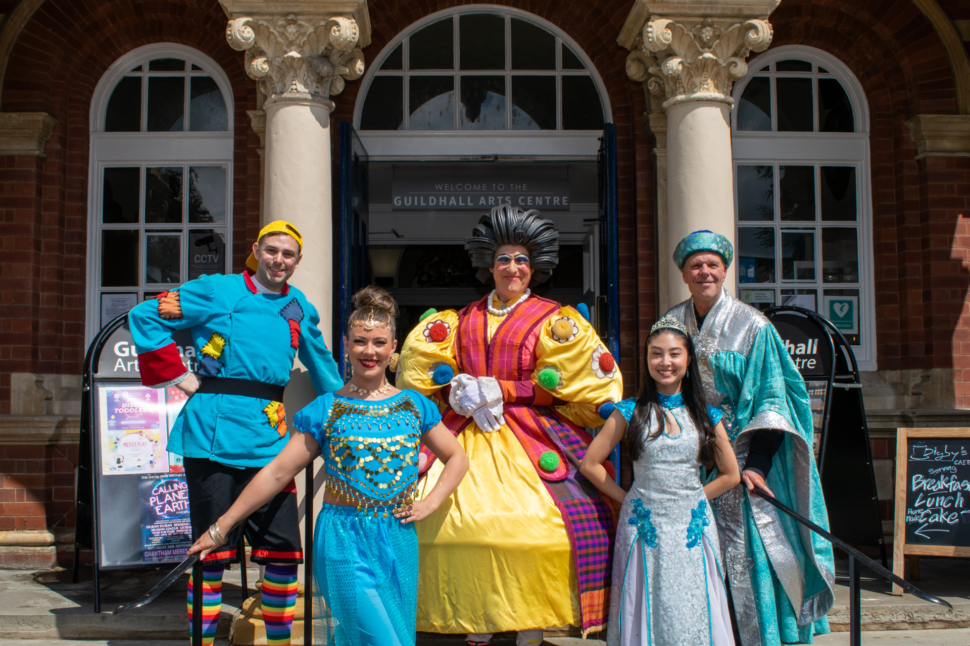 Panto cast at the front of the Guildhall Arts Centre