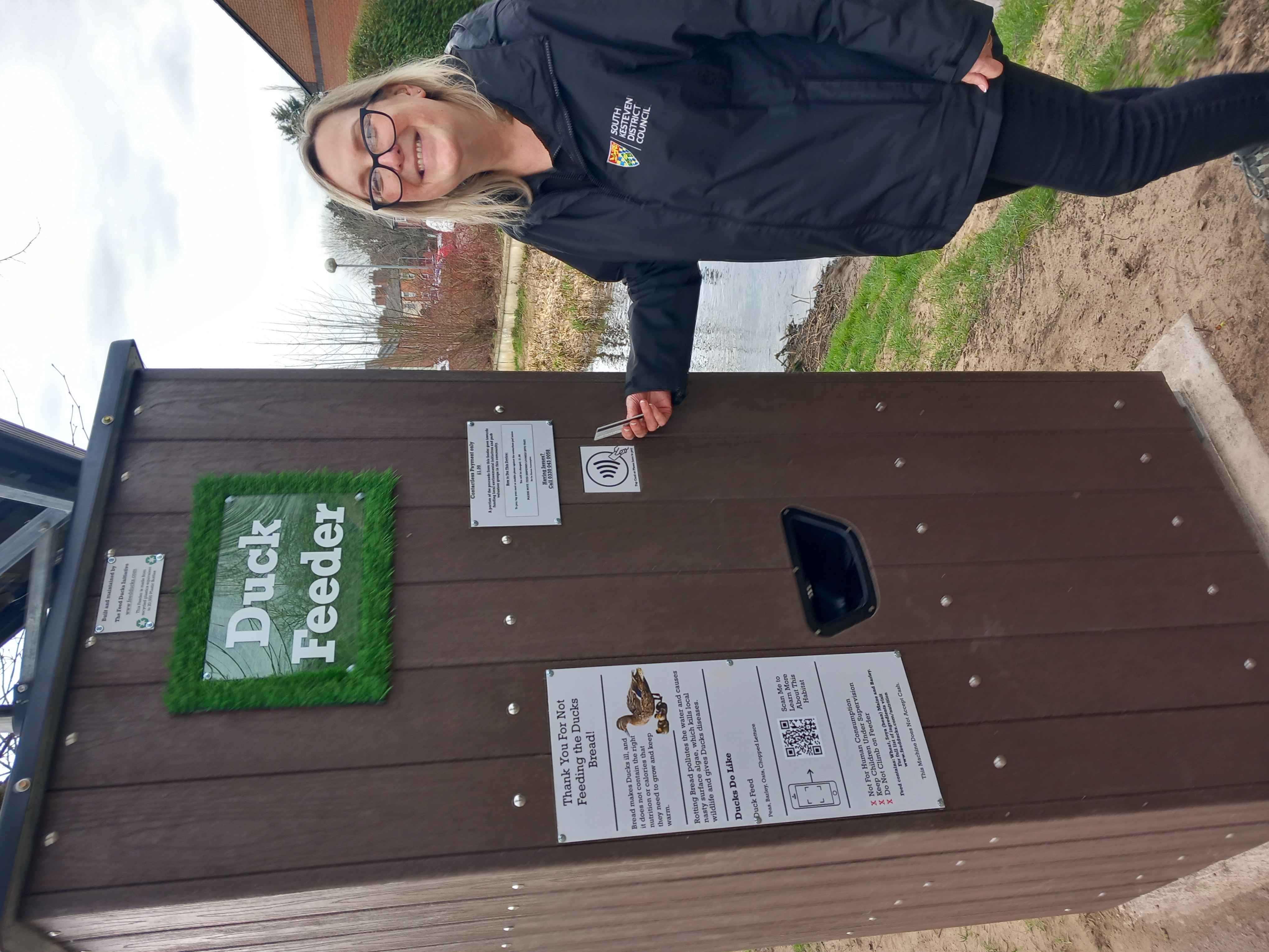 SKDC Parks Officer Sharon Haythorn at the Wyndham Park bird feeder