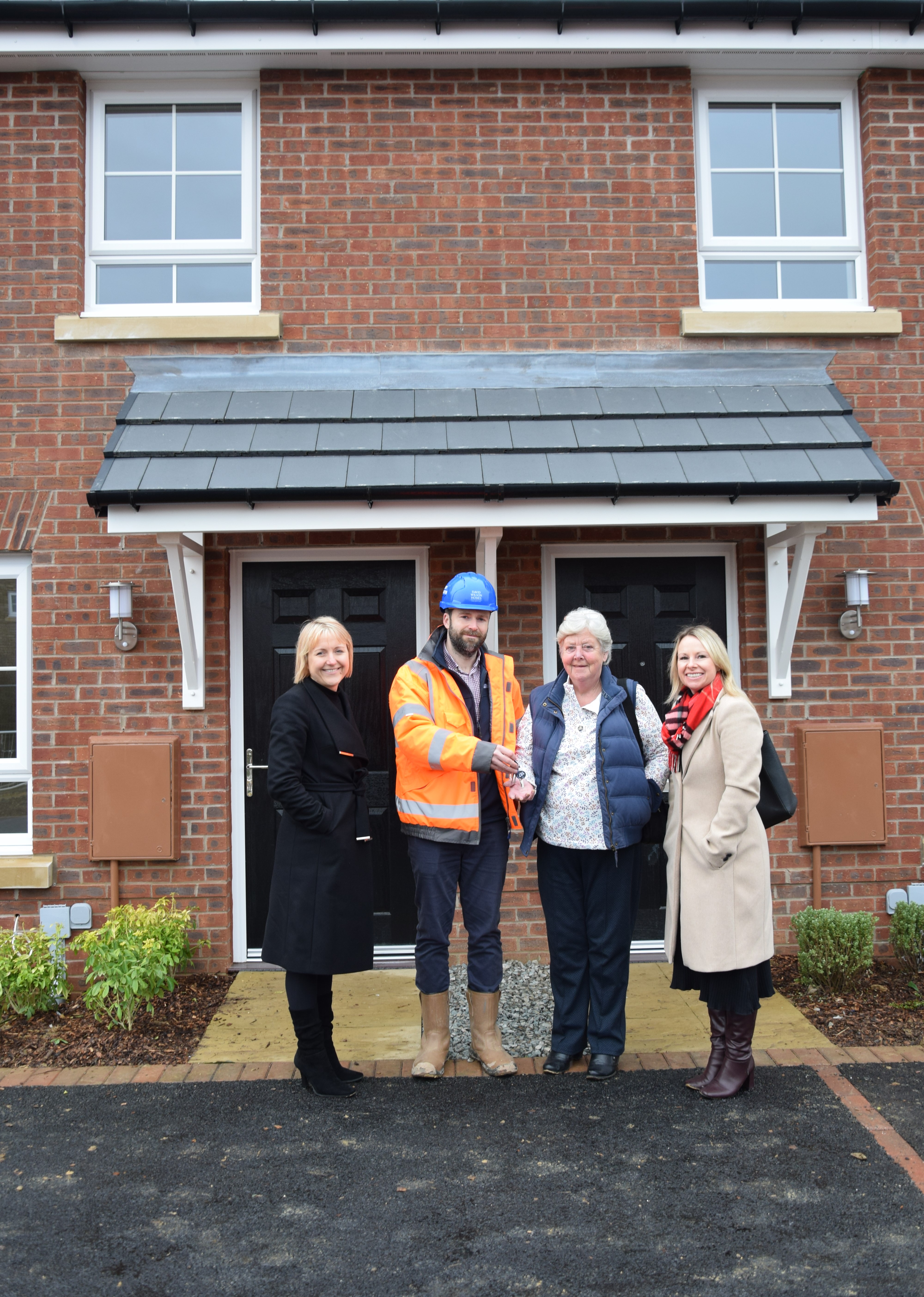 SKDC Director of Housing Alison Hall-Wright, Terry Gilmartin of David Wilson Homes, SKDC Cabinet Member for Housing Cllr Virginia Moran, and SKDC Head of Corporate Projects Debbie Roberts.